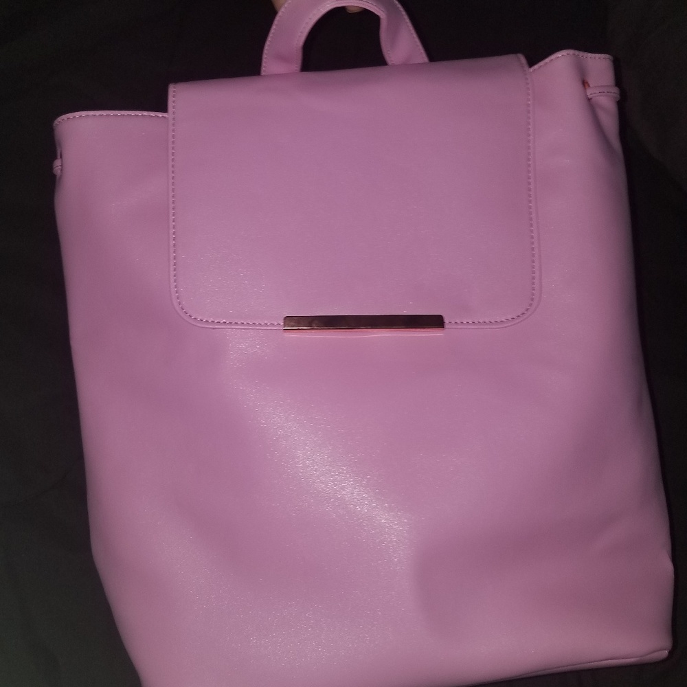 Pink backpack with metallic clasp